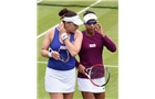 BIRMINGHAM, ENGLAND - JUNE 15:  Raquel Kops-Jones and Abigail Spears (L) of the United States confer during the Doubles Final during Day Seven of the Aegon Classic at Edgbaston Priory Club on June 15, 2014 in Birmingham, England.  (Photo by Tom Dulat/Getty Images)
